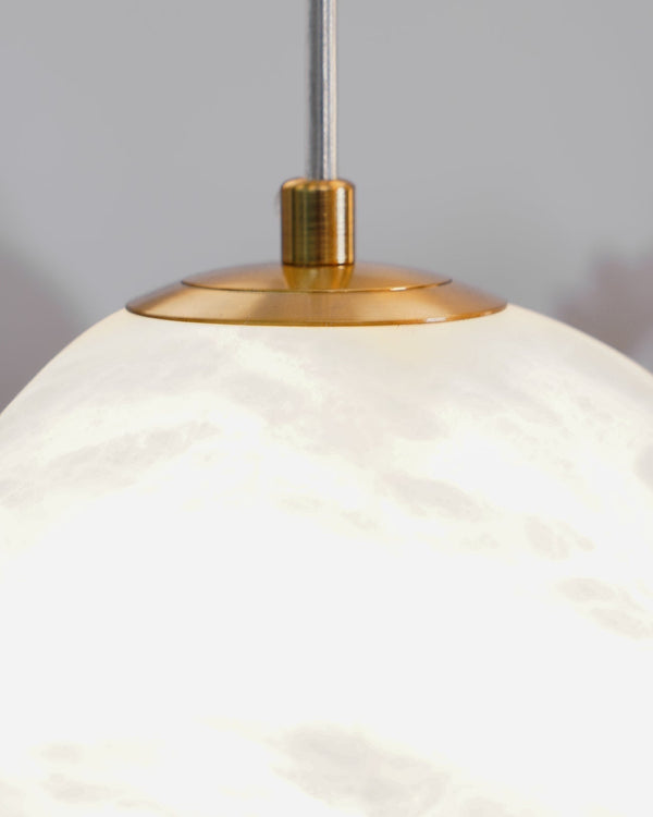 Hand‑Chiseled Galet Alabaster Brass Pendant Lamp – Sculptural Shine